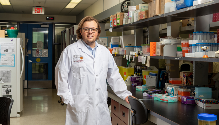 Assistant Professor Josh Koenig in the lab